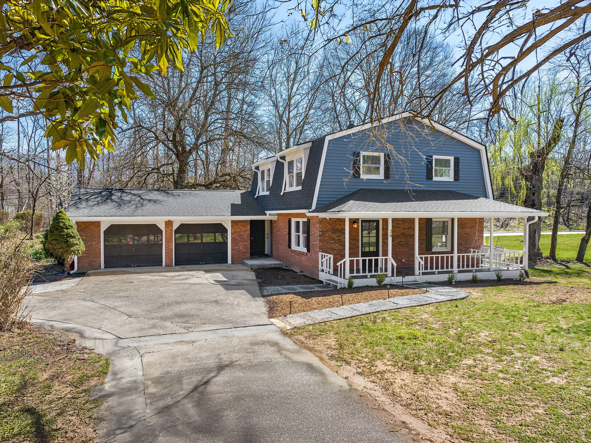 Luxury mountain home exterior with warm lighting